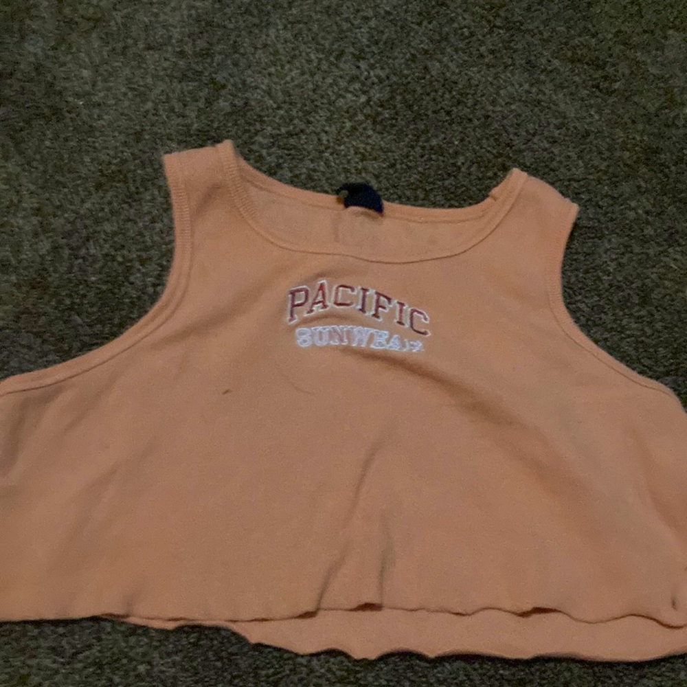 Orange crop top from Pacson.